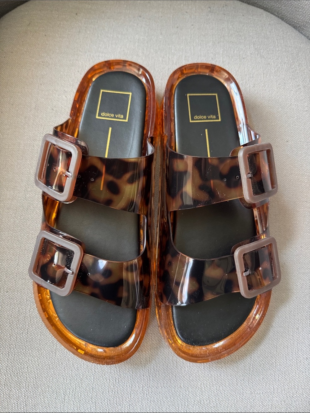 Dolce Vita Tortoiseshell Buckle Jelly Slides in Amber Brown